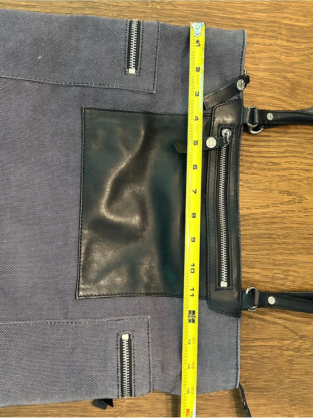 MZ Wallace navy canvas tote with leather pocket and handles